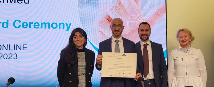 Giovanni Gorgoni receives the award for COReHealth